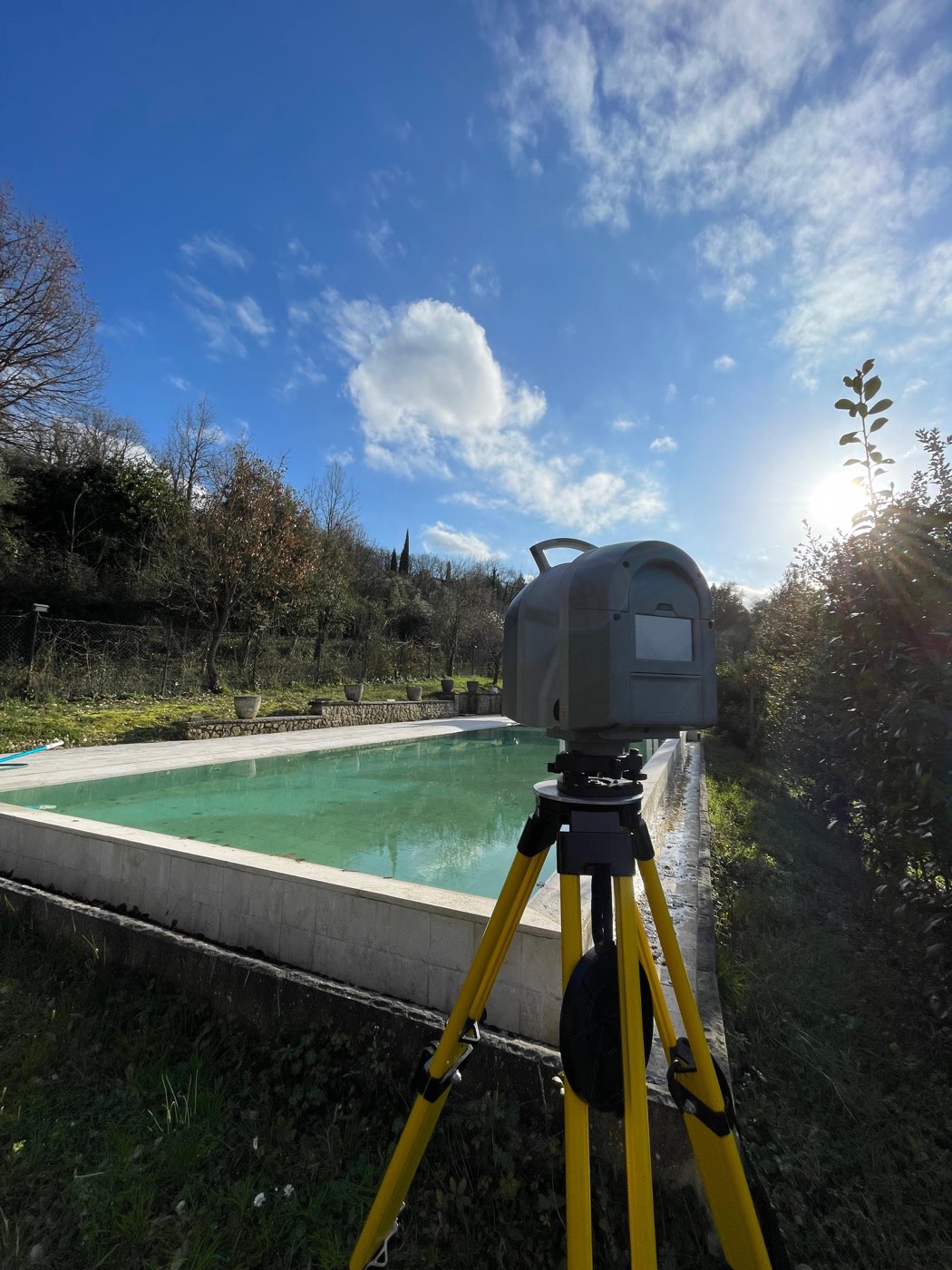 Scanner on the pool edge in low winter sun